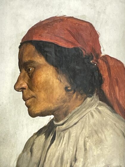 Frau mit rotem Kopftuch